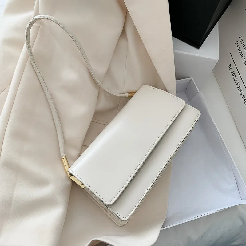 Madison™ - Bolsa de Ombro Atemporal