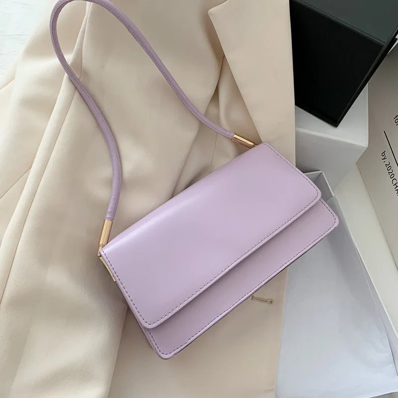 Madison™ - Bolsa de Ombro Atemporal