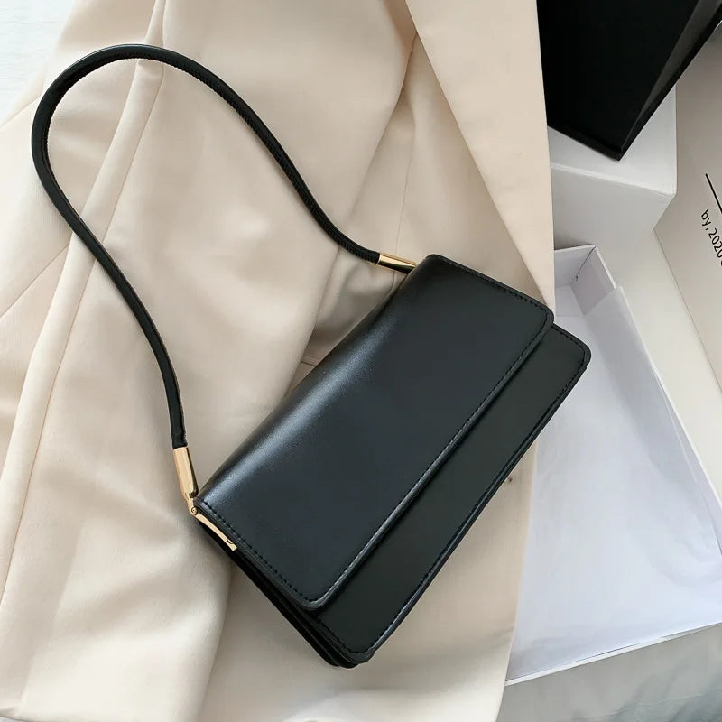 Madison™ - Bolsa de Ombro Atemporal