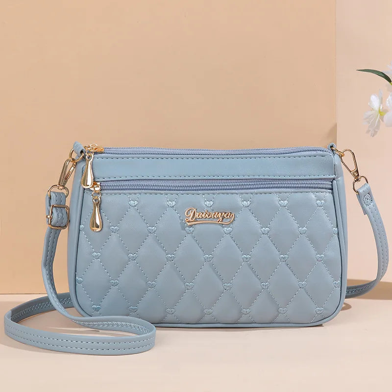 Lily™ - Bolsa Carteiro para Bordado