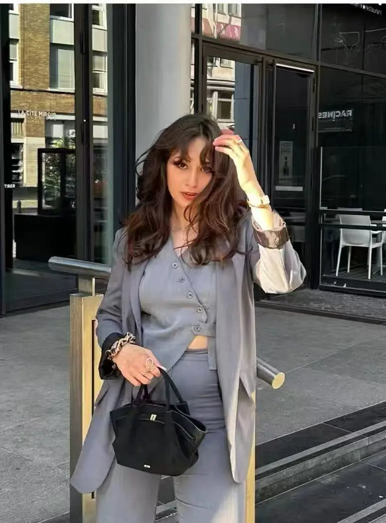 Riley™ - Bolsa Pequena de Couro Camurça para Axila